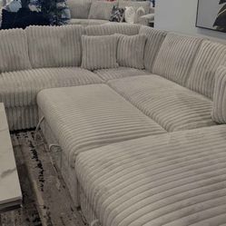 Grey Sectional With Pull Out Bed & Storage Chaise