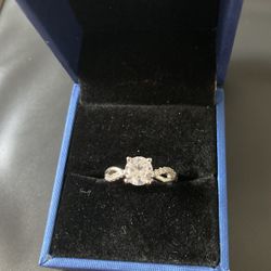 Certified Authentic 1k Moissanite Ring