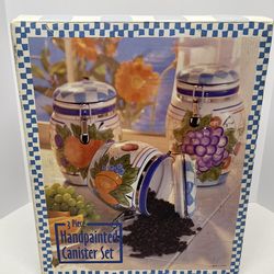 This Capriware Michael's Orchard 3-piece hand-painted ceramic canister set