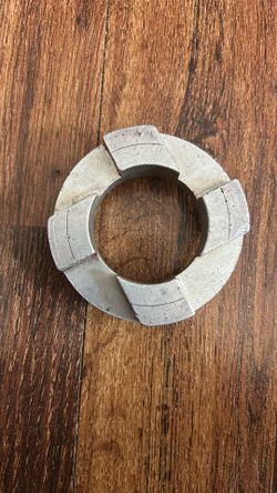 The image shows a spindle nut, specifically a type used for Dana 60 and 70 axles.  