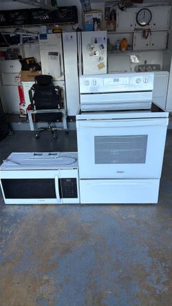 Whirlpool five-burner stove and Samsung microwave
