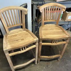 Set of 2 Teak Bar/Counter height Stools (made by wooden duck)  Located in concord  Good condition  No wobbling   Measures: 19” wide; 16” deep; seat he