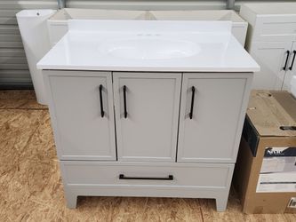BRAND NEW 36" Style Selections Light Gray Bathroom Vanity with White Engineered Cultured Top.