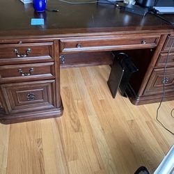 Wooden desk with locking filing cabinets
