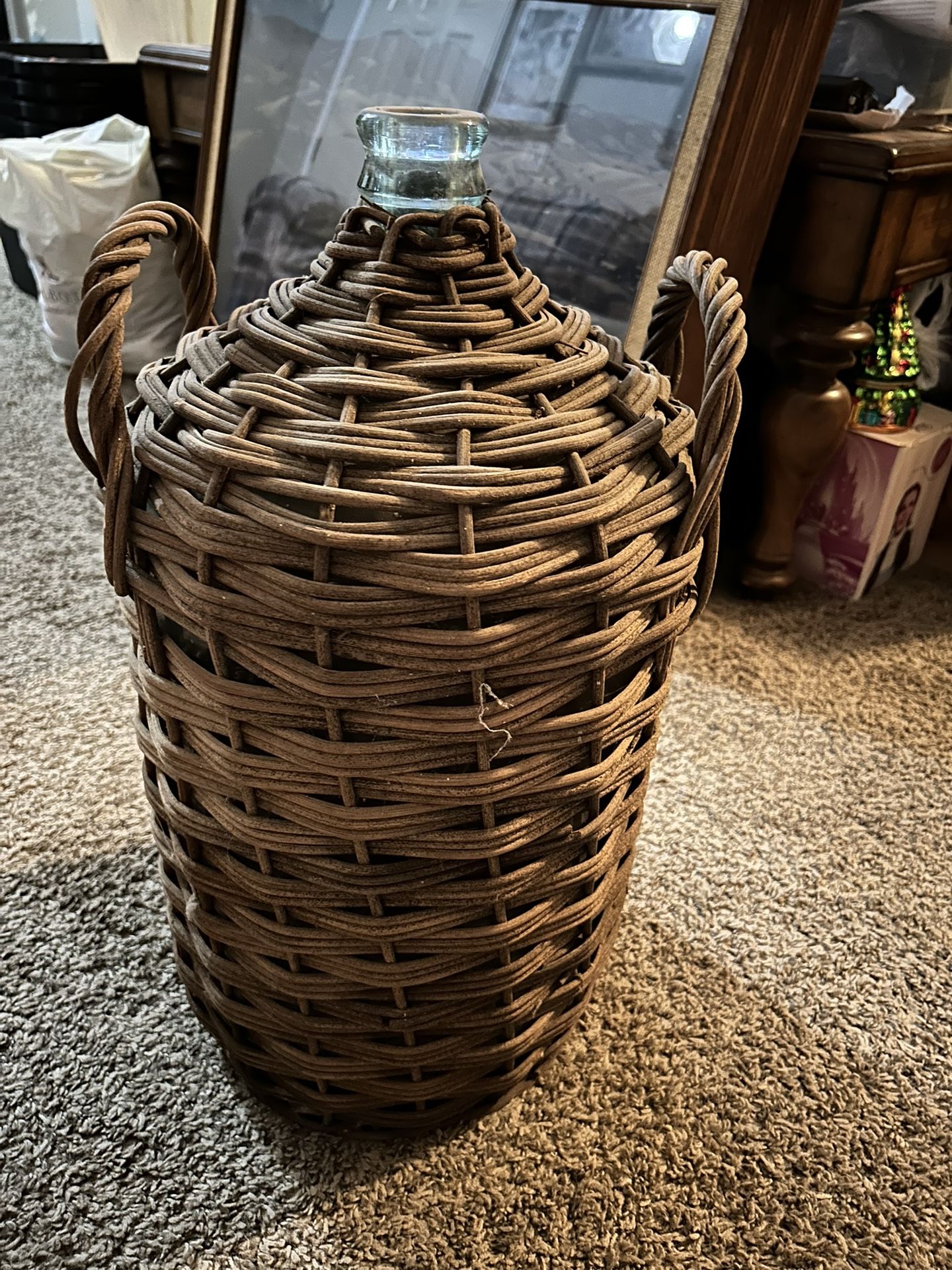 Old wicker wine bottle