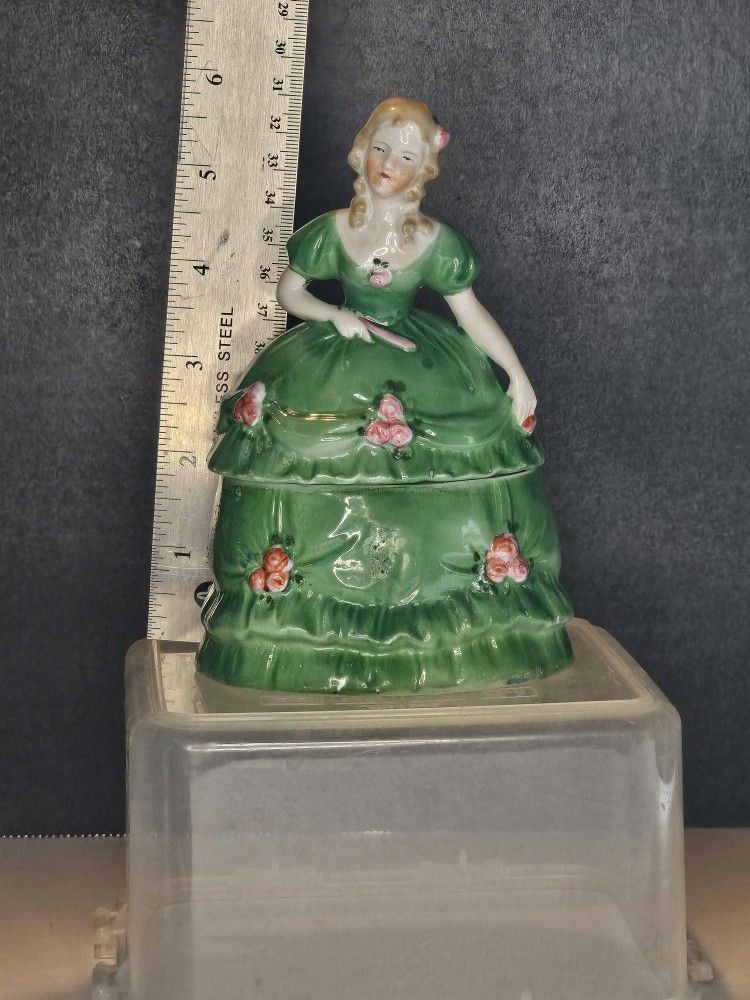 VTG Porcelain Trinket / powder box. Lady with light brown ringlets in green dress