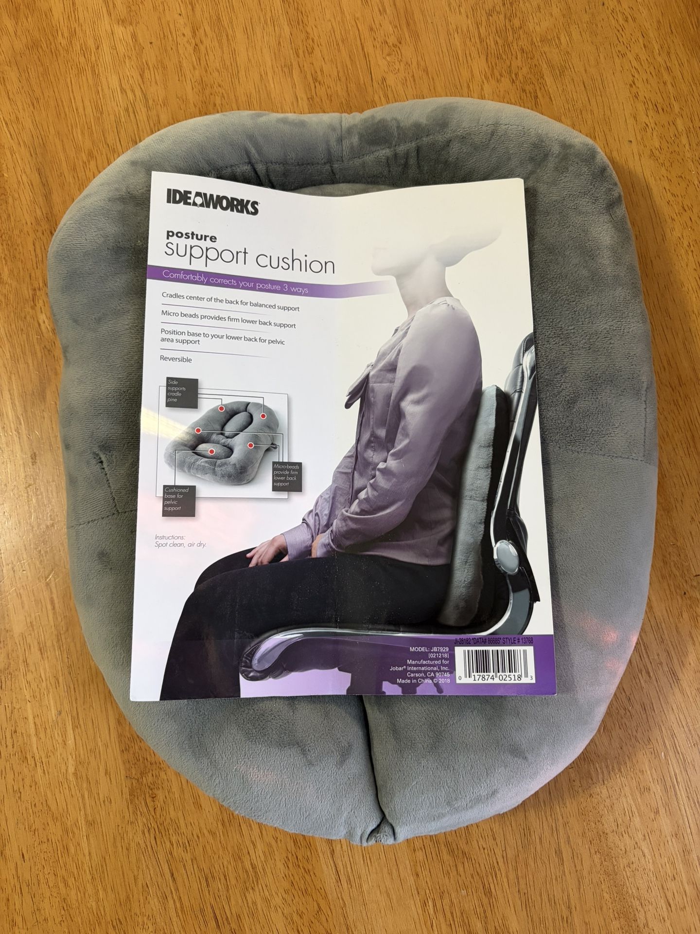 Ideaworks Posture Support Cushion (Model: J87829). It is designed to comfortably correct posture in three ways:
