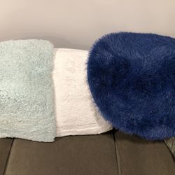3 small rugs