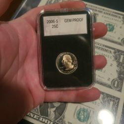 2006-S Washington Quarter in a "GEM PROOF" certified holder. This coin is part of the United States Mint's 50 State Quarters Program. 
