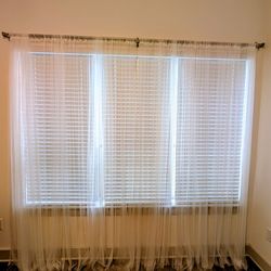 White No-Drill Sheer Curtain Solution – IKEA LILL Panels + Tension Rod ($35 / set)