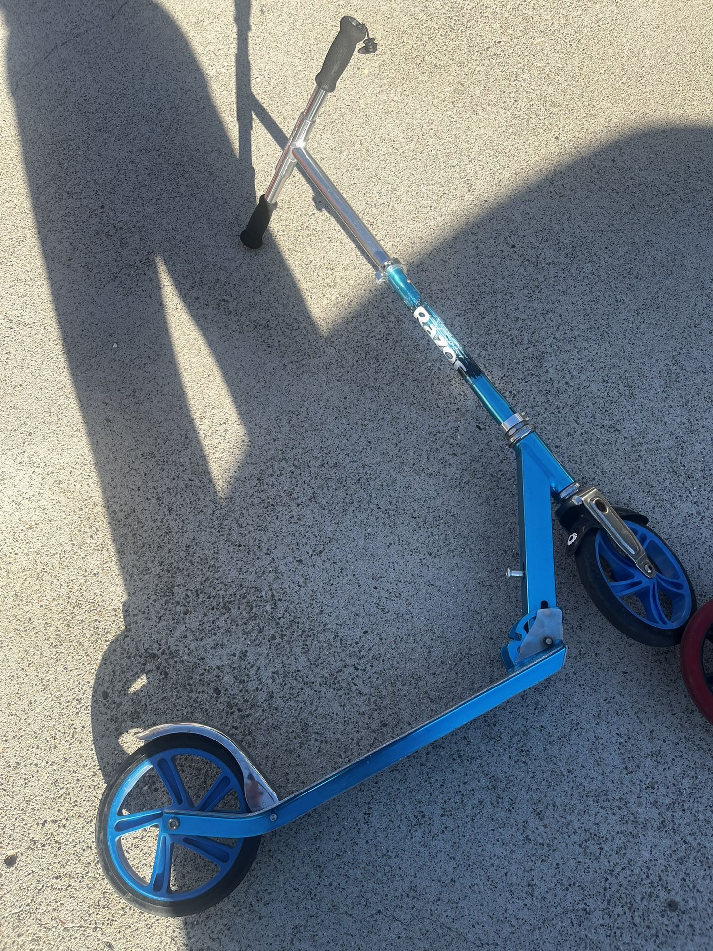 Two Large Razor Scooters (Blue And Black)
