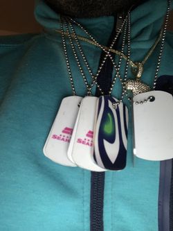 Silver And Black Seahawk Chains Black Ones Are Longer
