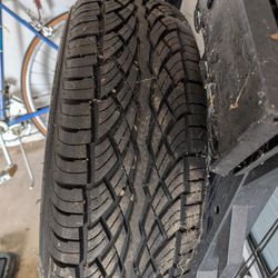 New Tire  235/70 R16
