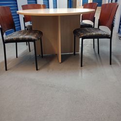 $ 220 round table and 4 chairs