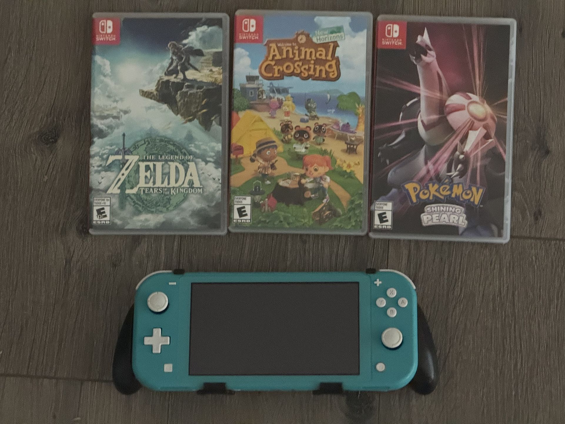Nintendo Switch Lite, Case, and Games Zelda Pokemon Animal Crossing 