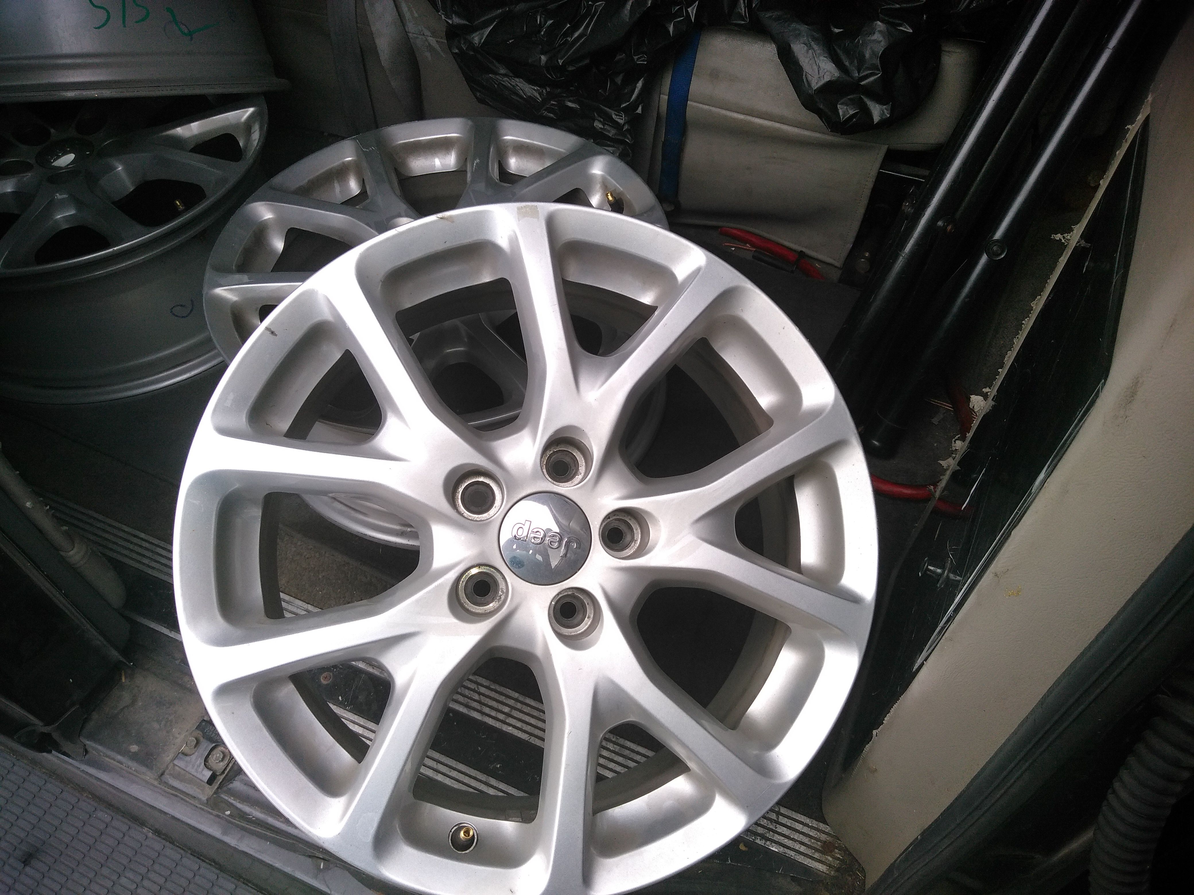 4 17in Jeep lattitude rims for sale asking $300 basically brand-new.