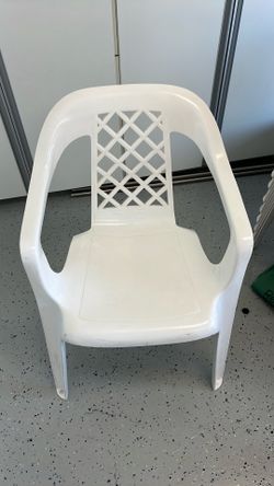 Plastic white chairs outdoor seating -12