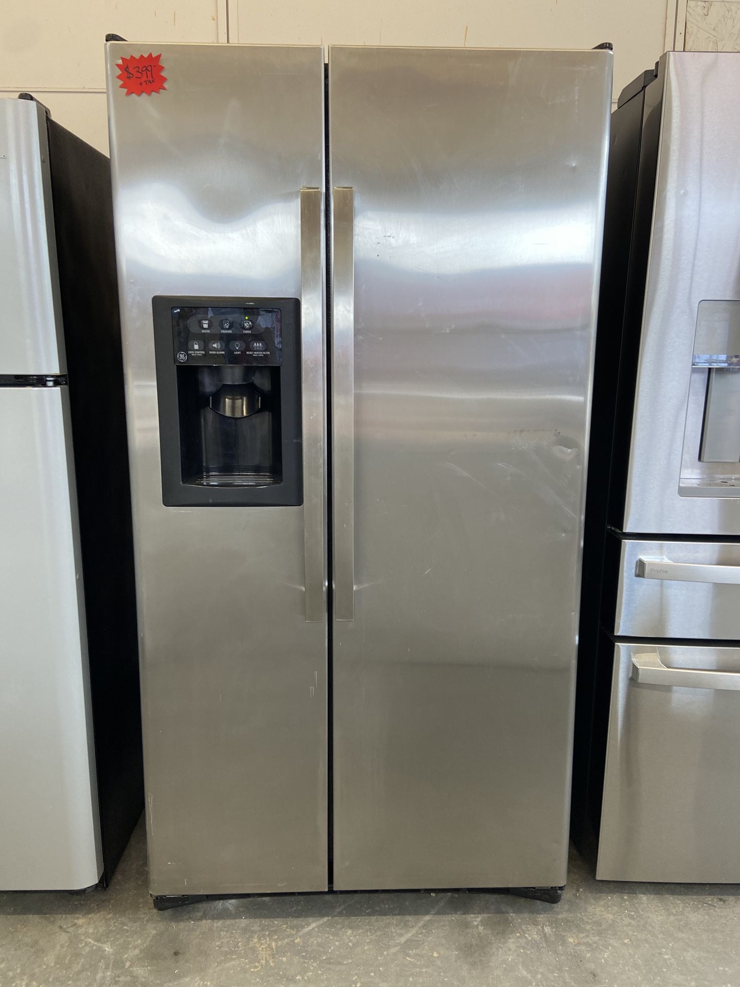 GE STAINLESS STEEL SIDE BY SIDE REFRIGERATOR