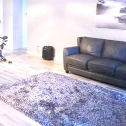 Beautiful Leather Sofas, Console , 75” Tv & Modern Dining Table