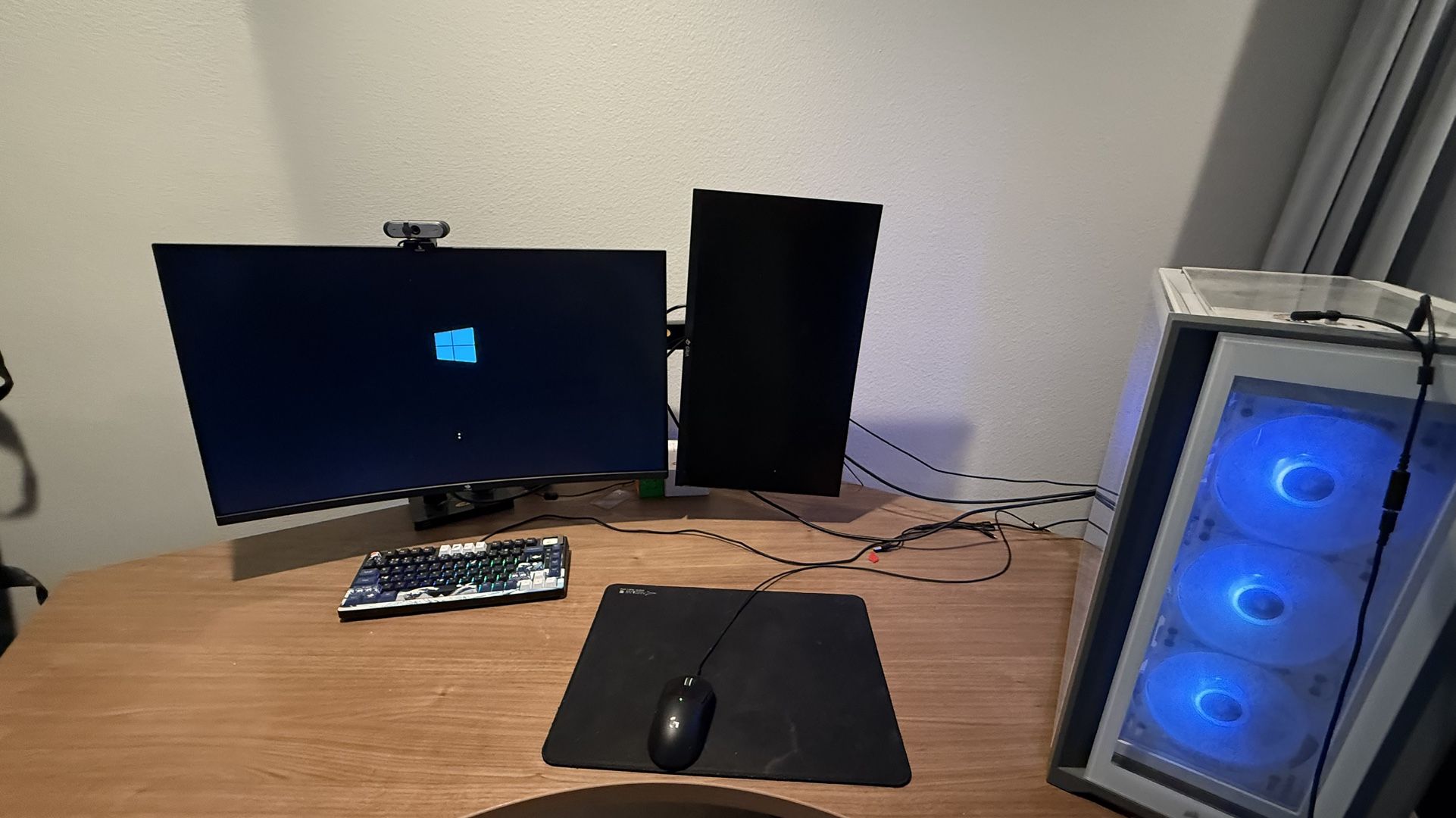 Windows 10 PC with monitors and accessories.