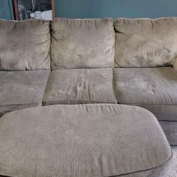 Grey Couch And Ottoman 