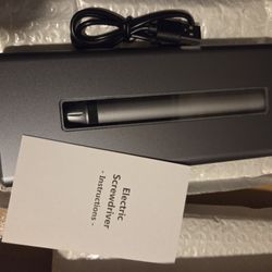 NIB Electric Screwdriver With Charging Station Case