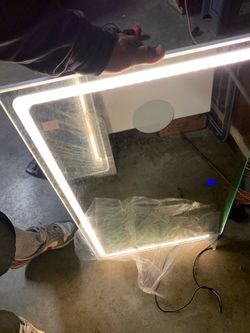 Lighted vanity mirrors