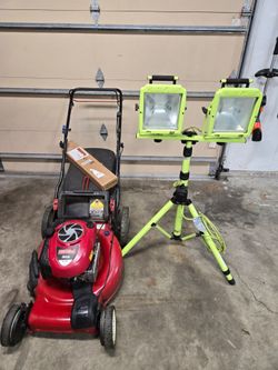 Lawnmower and site light 
Both work
$149 for both