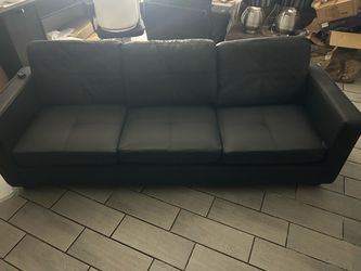 Black leather sofa