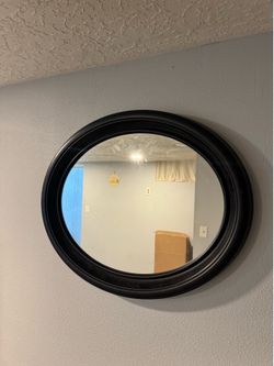 Oval frame mirror