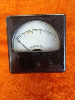 Vintage Burlington instrument CO. PANEL METER WITH A square black casing for sale.