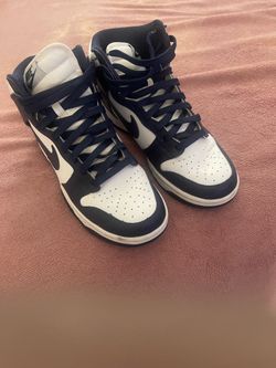 Navy blue Nike high tops dunks