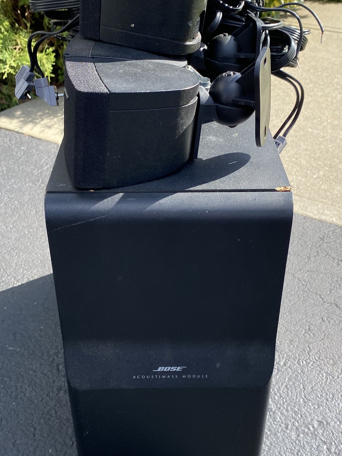 BOSE SPEAKER WITH SUB AND FOUR STANDS