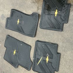 Black Chevy Rubber Floor Mats With Chevy Logo In The Middle