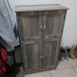 Beautiful cabinet asking $100 cash must pick up Broadway and apache buckeye az paid $125+ on Amazon can help load has movable Shelving as well