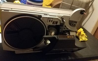 Vintage Bell & Howell motion picture projector 8mm 1440