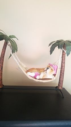 Dog statue on vacation - Sleeping on Hammock