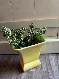 Yellow vintage flower vase