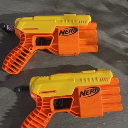 2 Nerf Guns And a Box Full Of Darts 