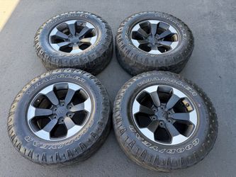 (4) 18” Dodge Ram Wheels Black/Silver 275/70R18 Goodyear Wrangler