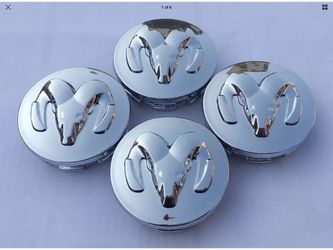 Glossy Silver New Dodge wheel Center Caps, Ram, Durango, Dakota.New lot of 4, missing the Metal O Rings
