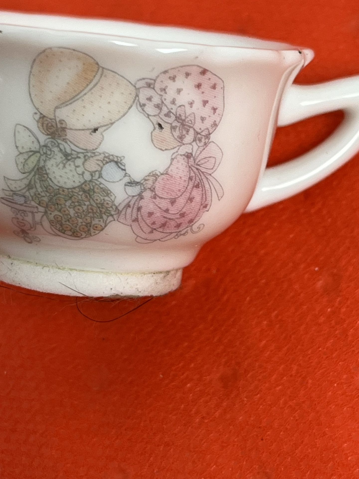 mini tea cup by Enesco is a precious moment from 1985, designed by Samuel J Butcher.