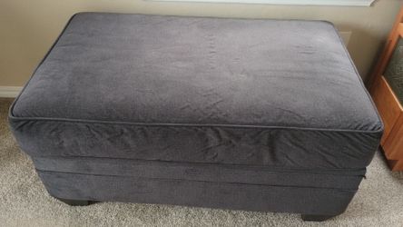 Gray ottoman with storage