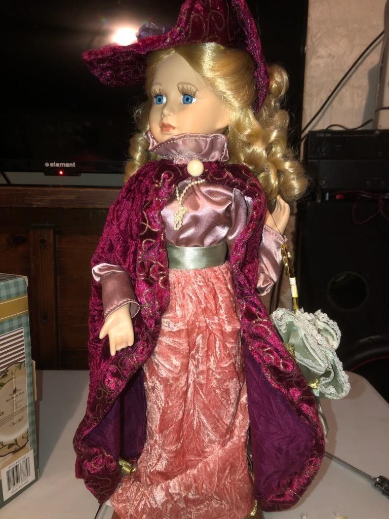 Moving antique doll
