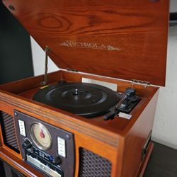 Record Player, CD, Cassette Player, AM/FM Radio, Bluetooth Music Streaming 