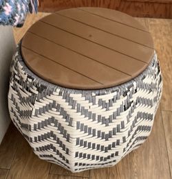 woven round  patio side table with a storage and wooden top