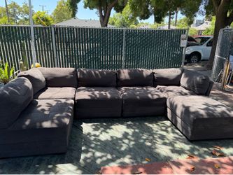 Five piece Couch with the Ottoman you can rearrange different ways. We sell all the time delivery $40 local.