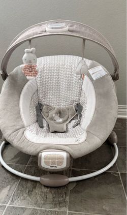 Ingenuity gender neutral baby bouncer with lights and music