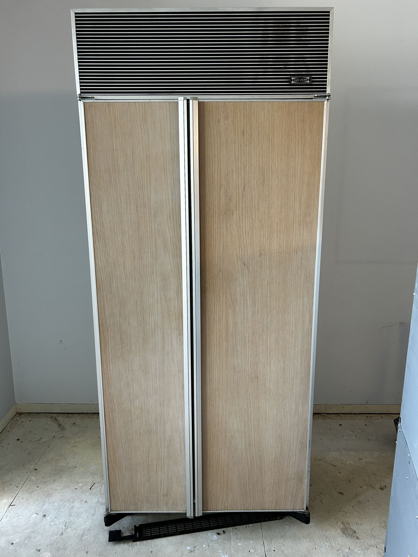 Late 90,s Sub Zero Refrigerator Wood Paneling