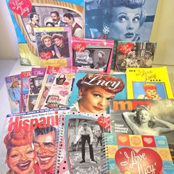 Love Lucy Lot of 16 Items, Address Book, 5 different types of Calendars, 2 Magazines, 3 Books,  5 of the  Lighter side Catalogs and 1 dvd... 